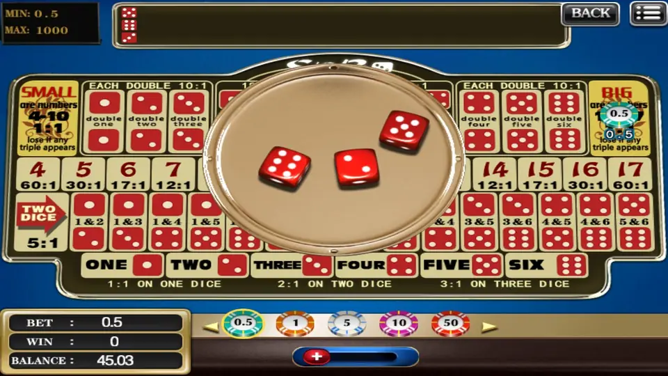 The dice revealed on the gold plate in the centre of the Sic Bo table