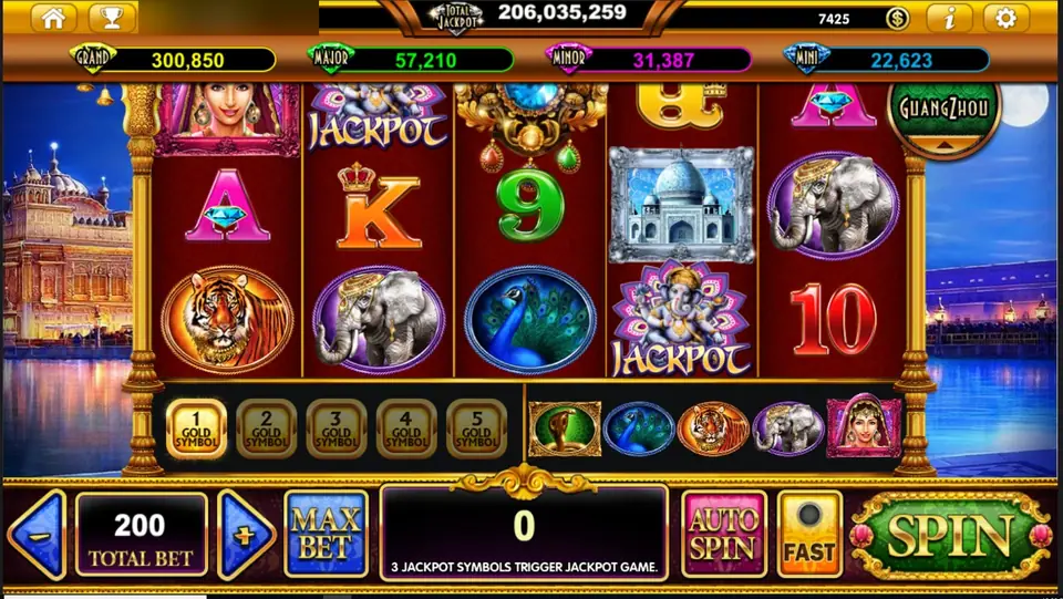 The Taj Majestic on Live22 with a tiger, an elephant, a peacock, a Taj Mahal tile, two Ganesha JACKPOT symbols and card letters on red reels