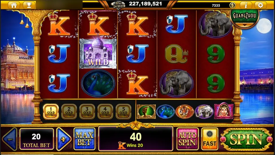 Ks across the top of reels 1 to 3 with the purple Taj Mahal WILD on reel 2, message box showing a K icon with Wins 20 and 40 in total